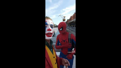 The Joker fights Spiderman in the middle of the street!!!!